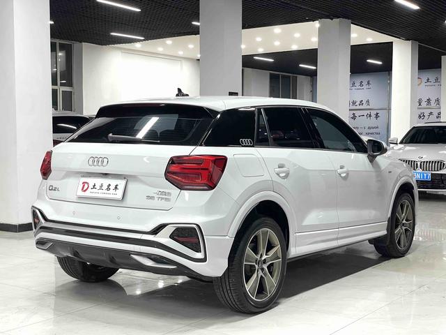 Audi Q2L 2022, фото 6