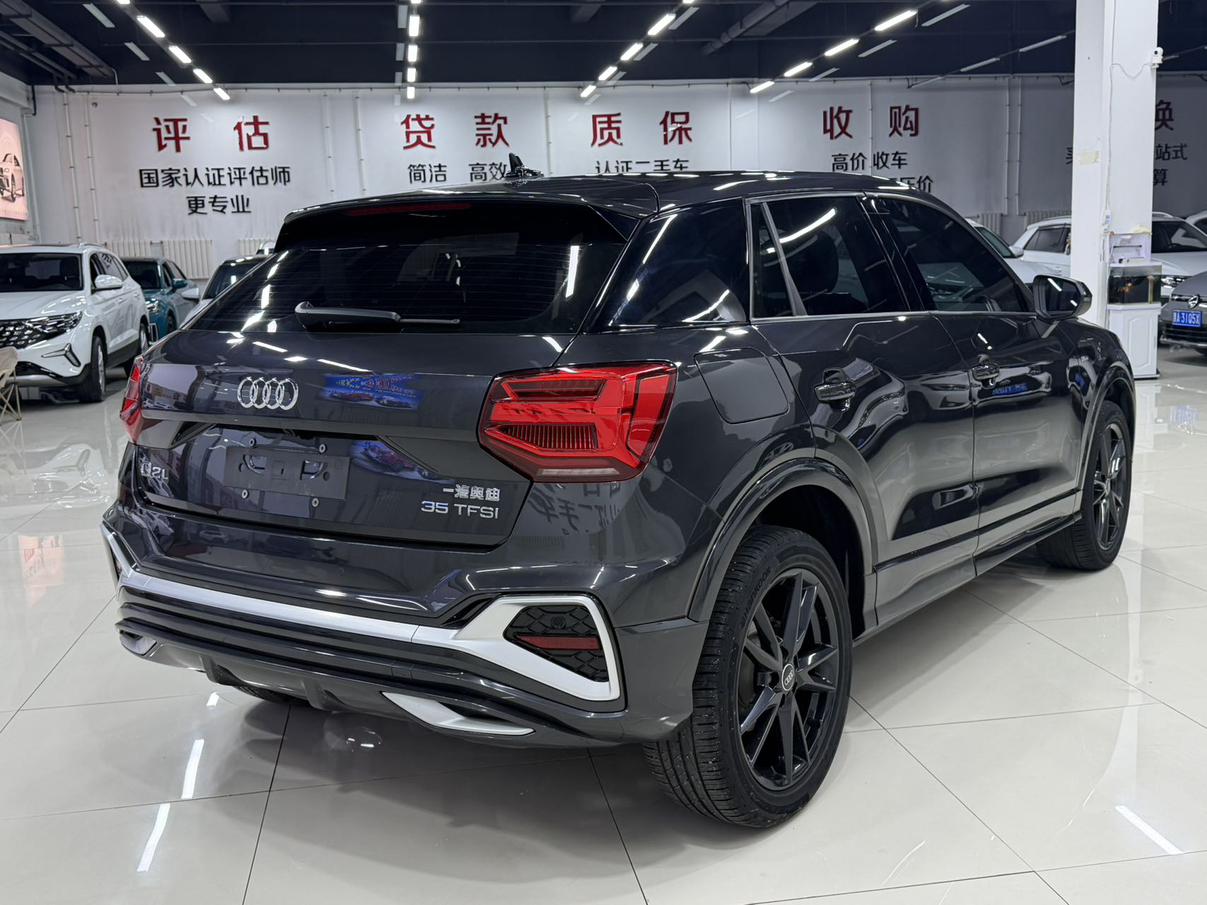 Audi Q2L 2022, фото 6