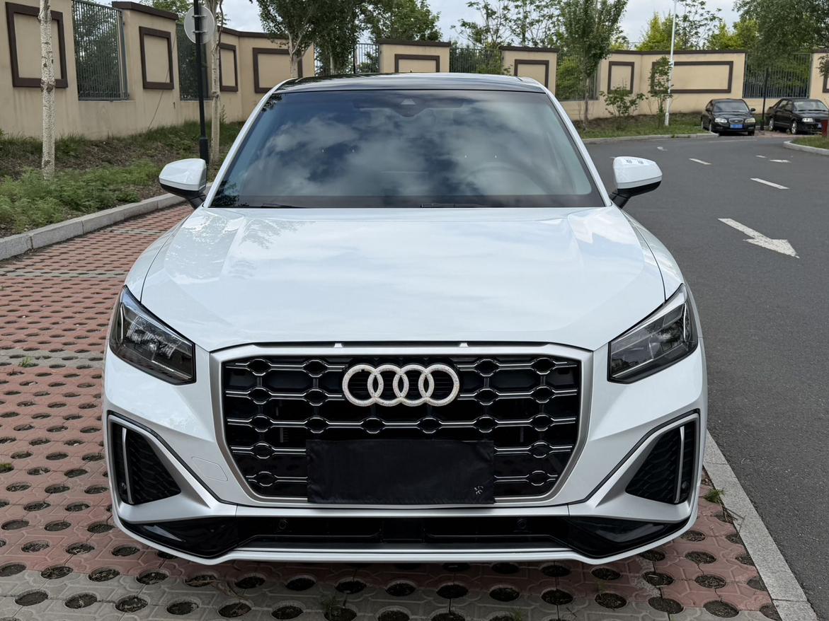 Audi Q2L 2022, фото 2