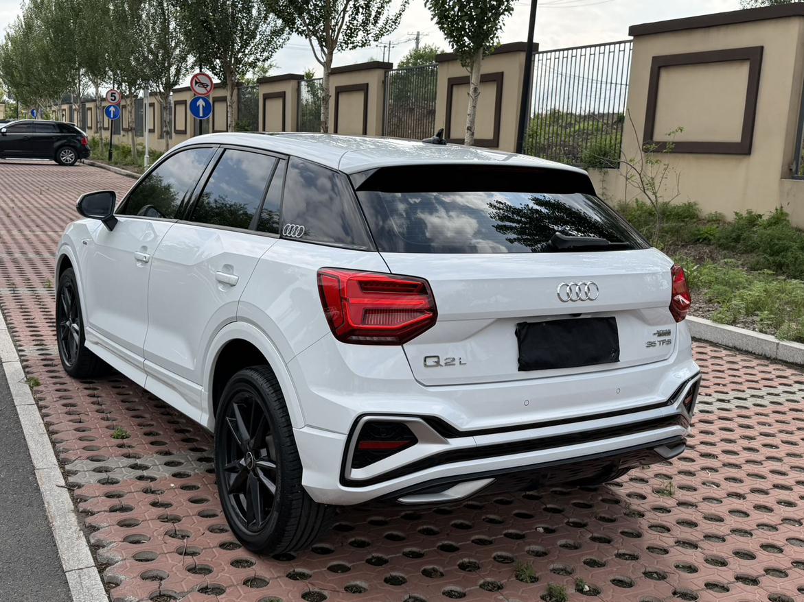 Audi Q2L 2022, фото 6