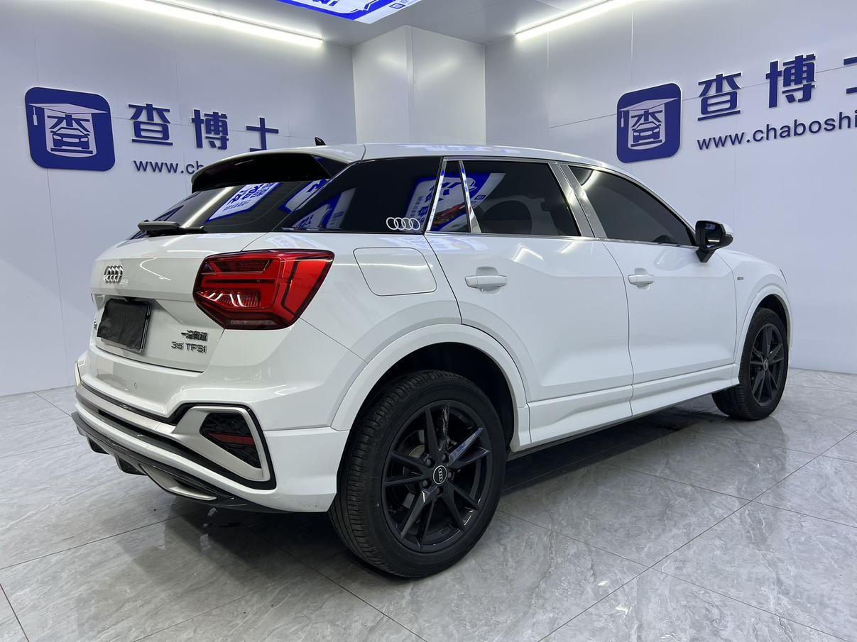 Audi Q2L 2022, фото 17