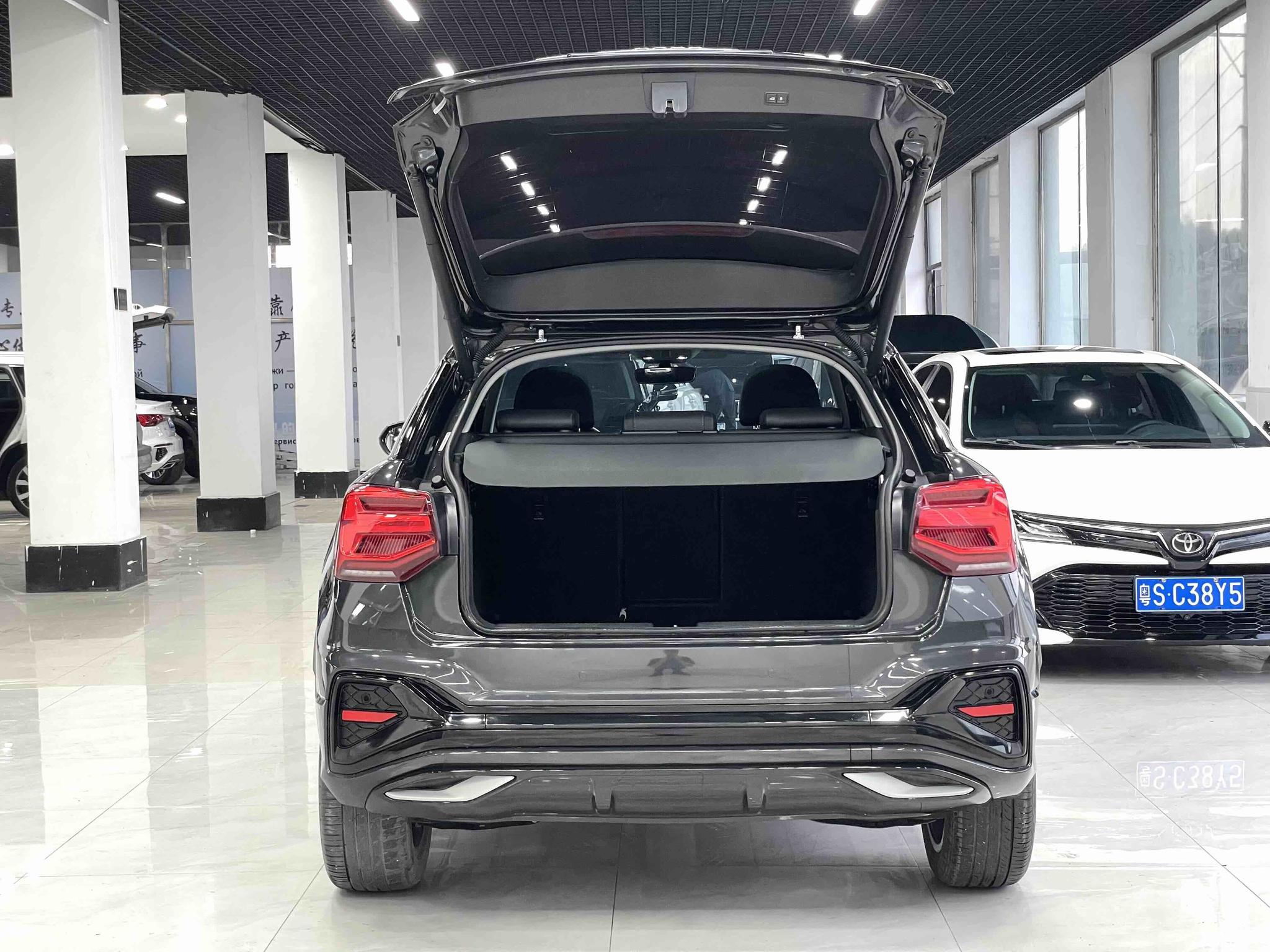 Audi Q2L 2022, фото 16