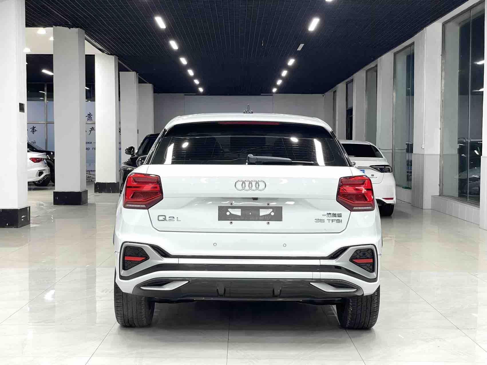 Audi Q2L 2022, фото 5